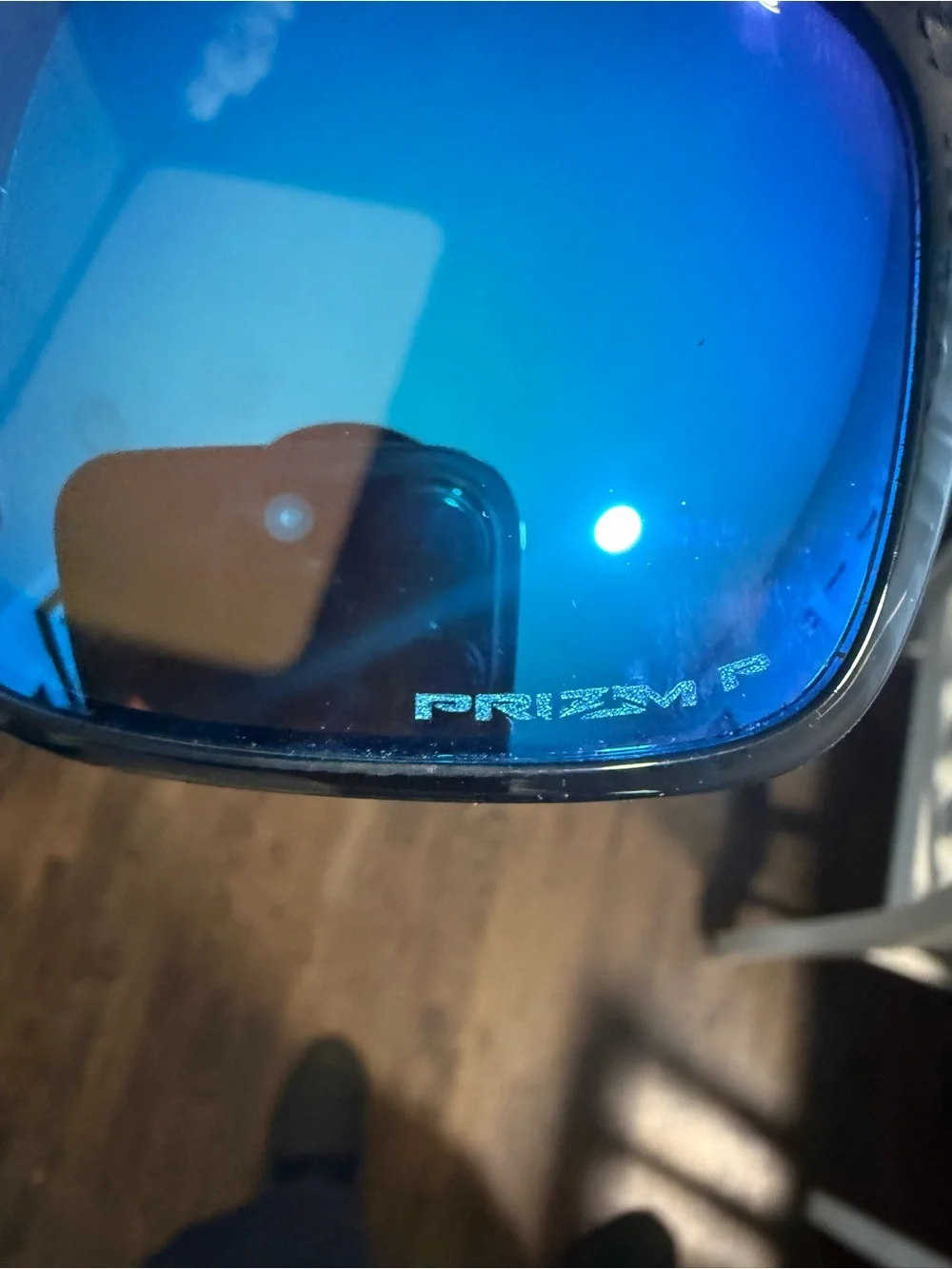 Oakley Black Frame Sunglasses with Blue Mirrored Lenses